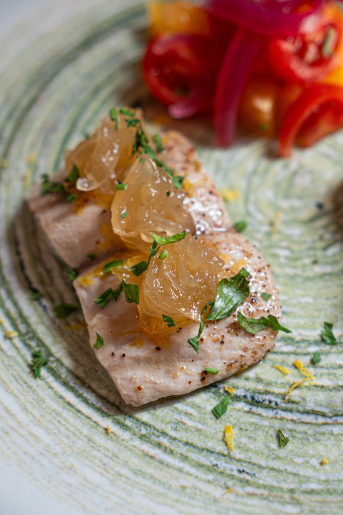 Filetto di pesce con spicchi d'agrume