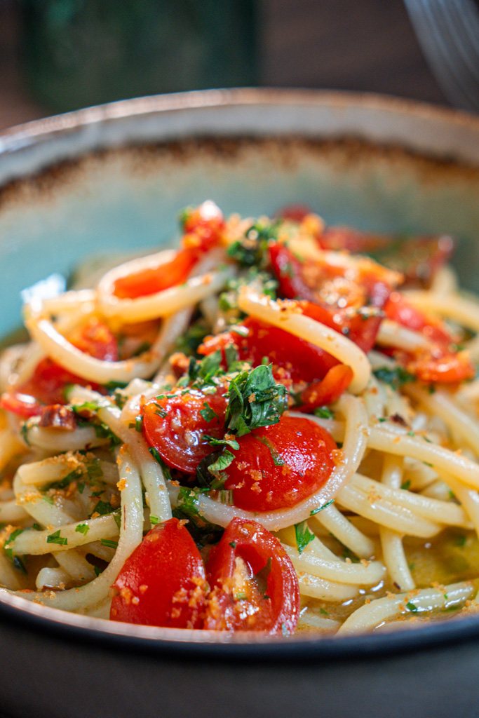 Spaghetti con pomodorini e prezzemolo